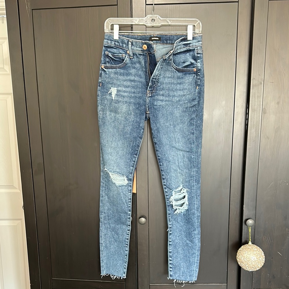 Express skinny jeans, size 6, regular distressed raw hem 
Brand new never worn